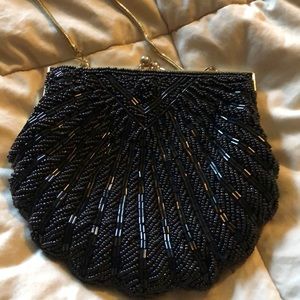 Shell shaped beaded dress up bag/purse.